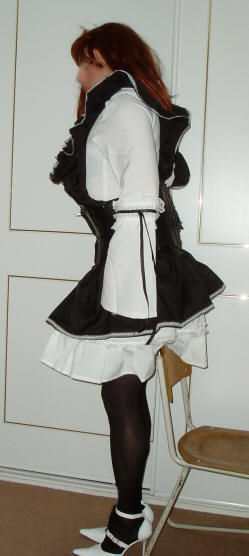 Gothic Maid Cosplay Costume, from the side. transgender transsexual cross dresser crossdresser bondage pictures stories fiction story