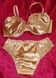 Gold underwear all ready laid out for Steve - transgender transsexual cross dresser crossdresser bondage pictures stories fiction story